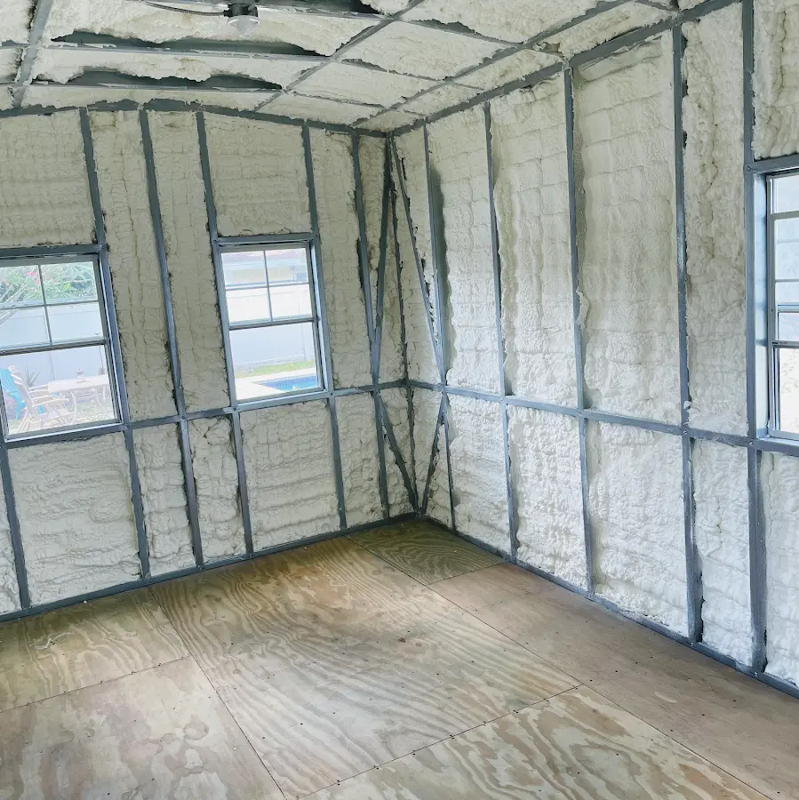 Closed-cell spray foam insulation applied to wall cavities in a residential project in Bernalillo