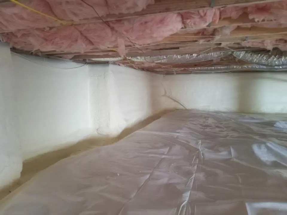 Crawl space encapsulation with closed-cell spray foam for Commercial Roof Restoration in Bernalillo